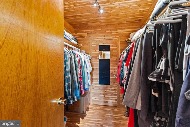 spacious closet featuring hardwood / wood-style floors