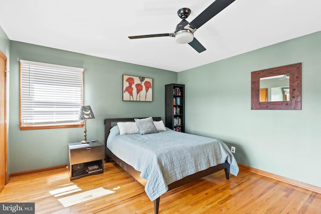 bedroom featuring ceiling fan and light wood-type flooring