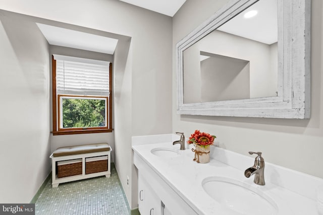 bathroom with vanity and tile patterned flooring