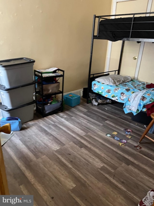 bedroom featuring hardwood / wood-style flooring