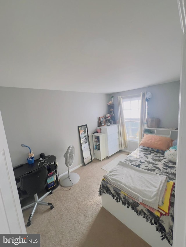 carpeted bedroom featuring vaulted ceiling