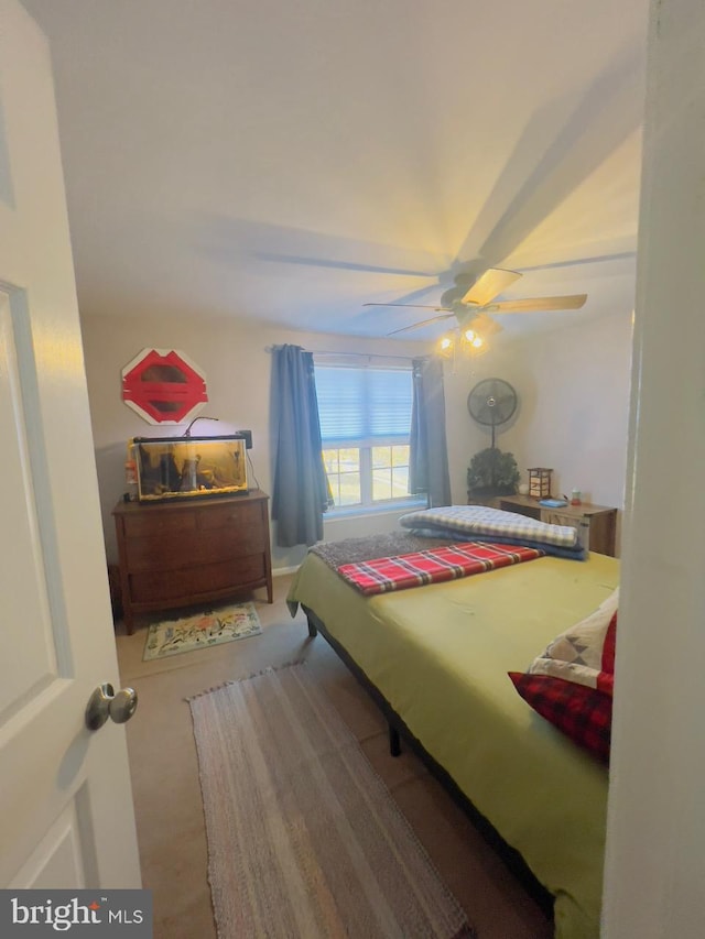 bedroom featuring ceiling fan