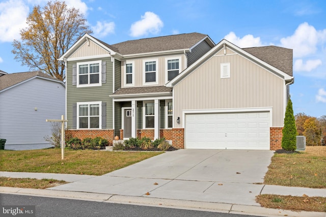 craftsman-style home with central AC unit, a garage, and a front yard