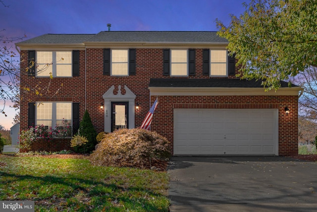 colonial-style house with a garage