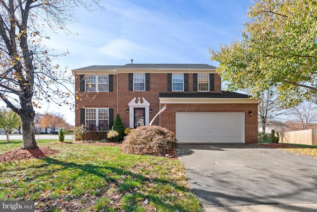 colonial house featuring a garage