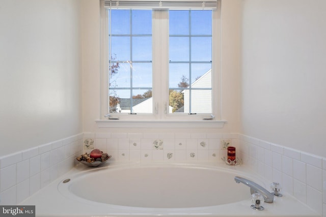 bathroom featuring a tub