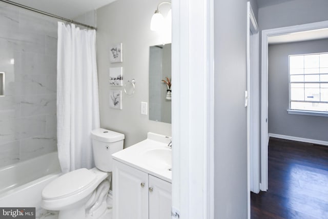 full bathroom featuring vanity, toilet, shower / tub combo with curtain, and hardwood / wood-style floors