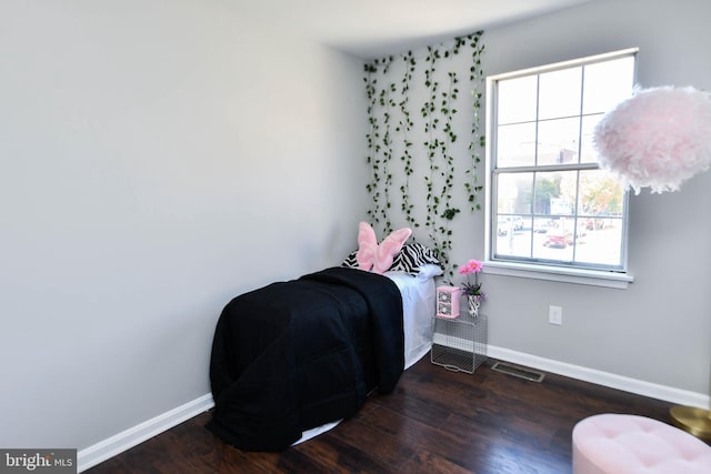 1140 1st St NW, Washington, DC 20001 - living area featuring baseboards, visible vents, and wood finished floors