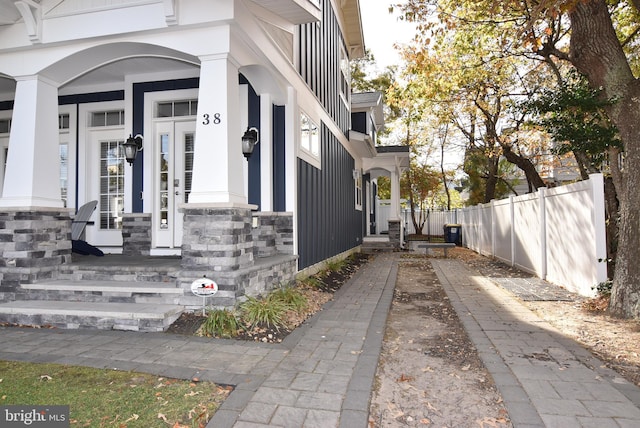 doorway to property featuring a porch