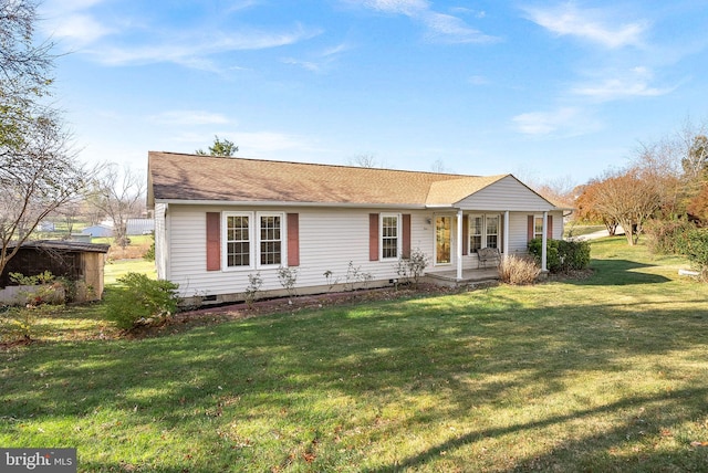 ranch-style home with a front lawn and a porch