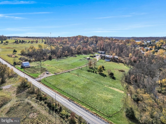 birds eye view of property featuring a rural view