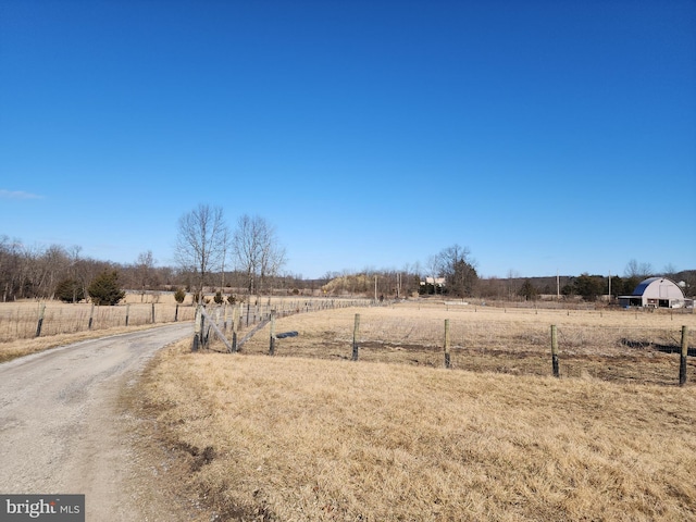 view of road with a rural view