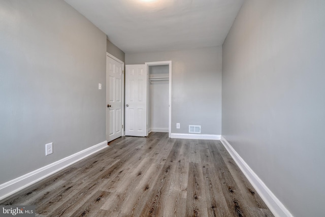 unfurnished bedroom featuring light hardwood / wood-style floors