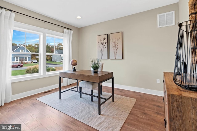 office space featuring dark wood-type flooring