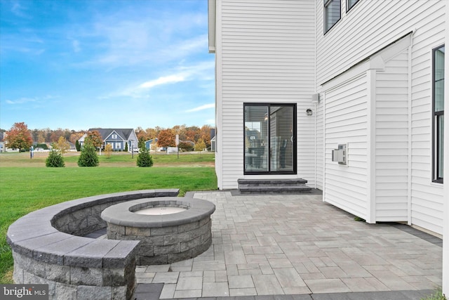 view of patio featuring a fire pit