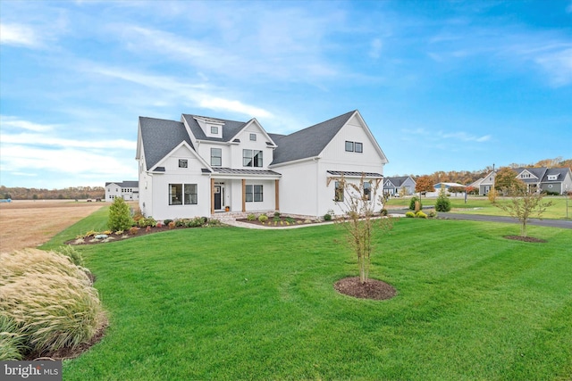 view of front of property with a front lawn