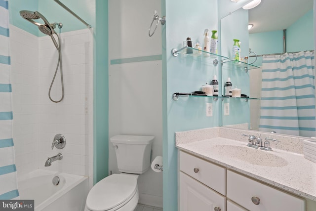 full bathroom featuring vanity, toilet, and shower / tub combo