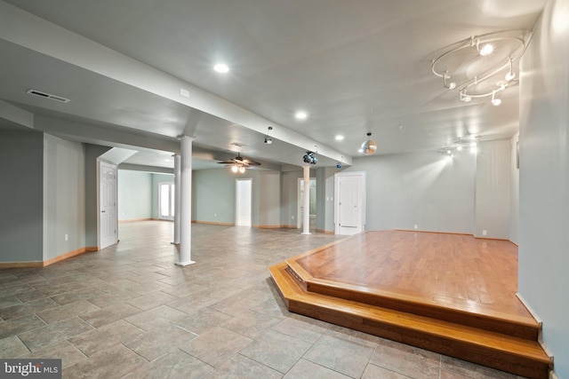 basement featuring ceiling fan