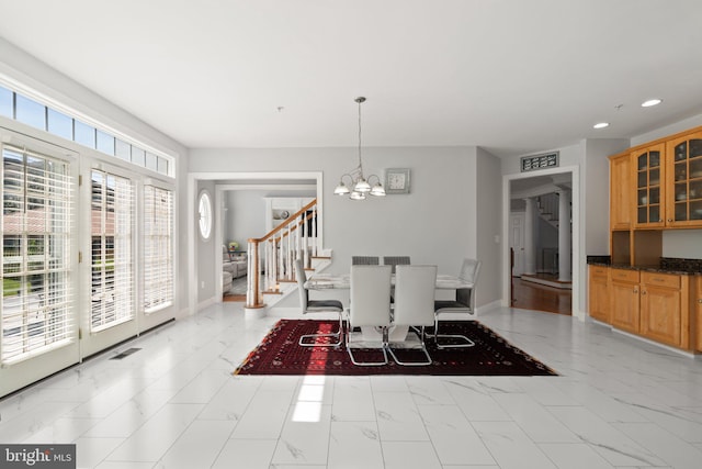 dining area with a chandelier