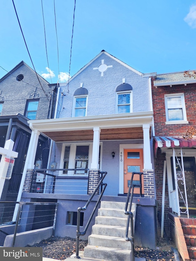 multi unit property featuring covered porch