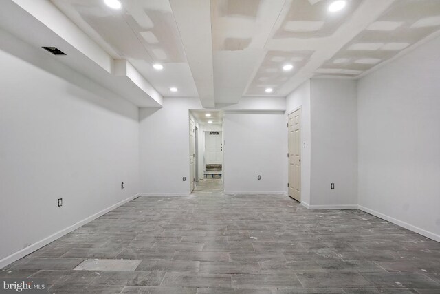 basement with wood-type flooring