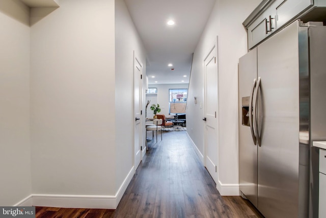 hallway featuring dark hardwood / wood-style floors