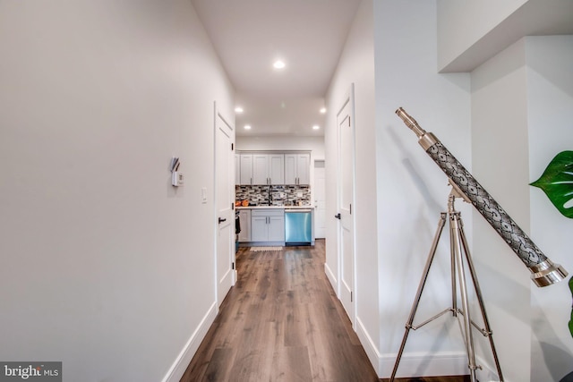 hallway with wood-type flooring