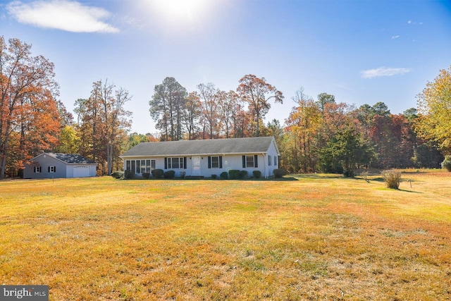 ranch-style house with a front lawn