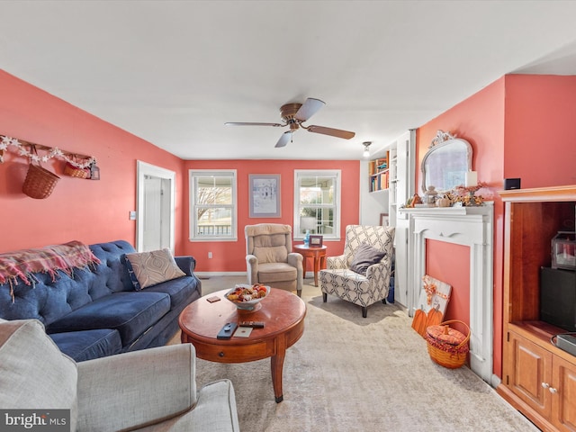 living room with light carpet and ceiling fan