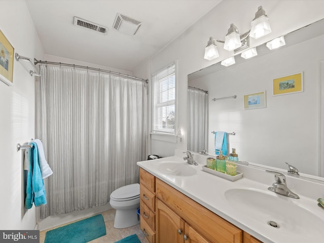 full bathroom featuring vanity, tile patterned flooring, toilet, and shower / bathtub combination with curtain