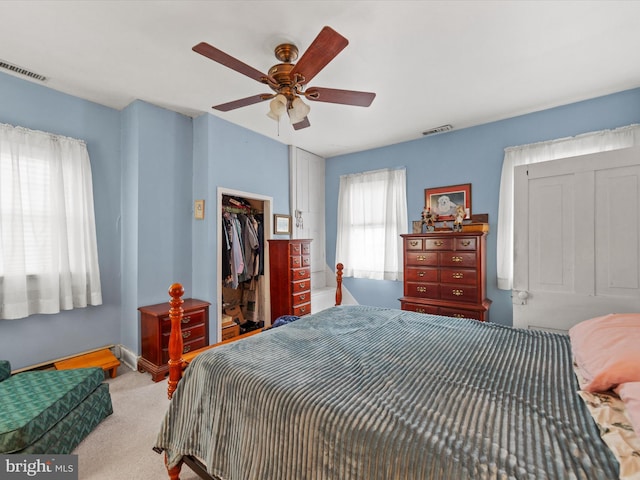 bedroom featuring a closet, carpet, and ceiling fan