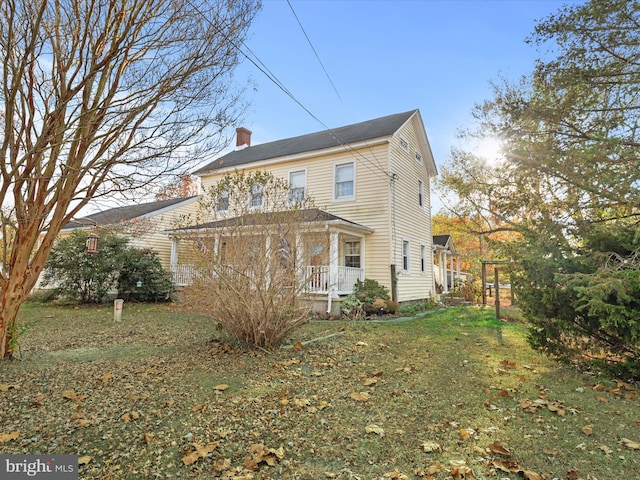 exterior space featuring a lawn