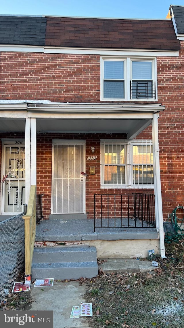 doorway to property with a porch