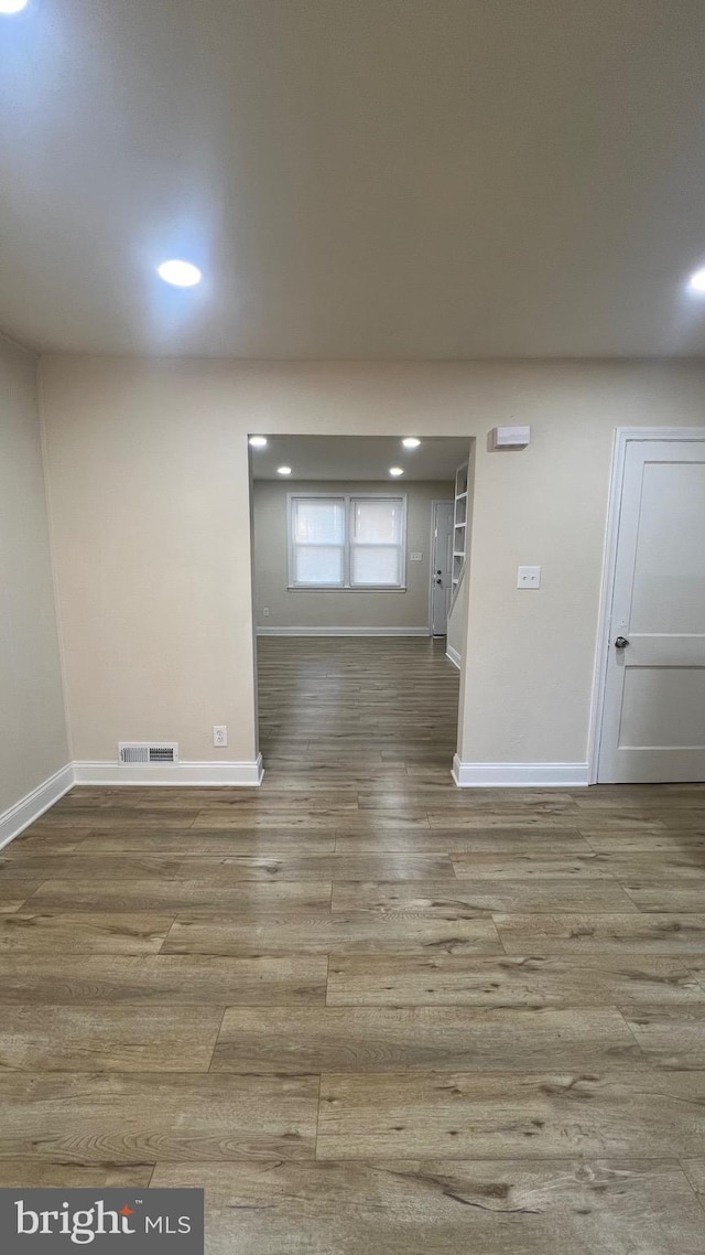 interior space with hardwood / wood-style flooring