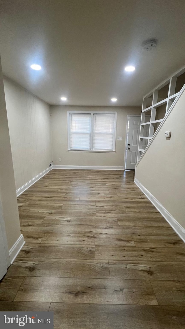 basement featuring hardwood / wood-style flooring