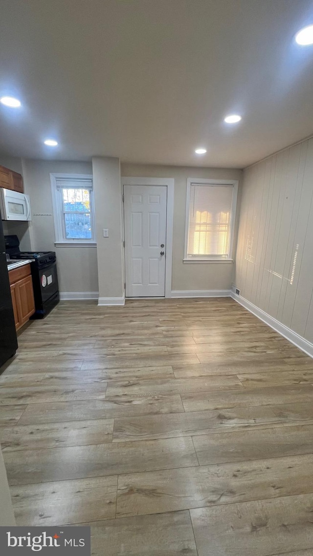 foyer with light wood-type flooring