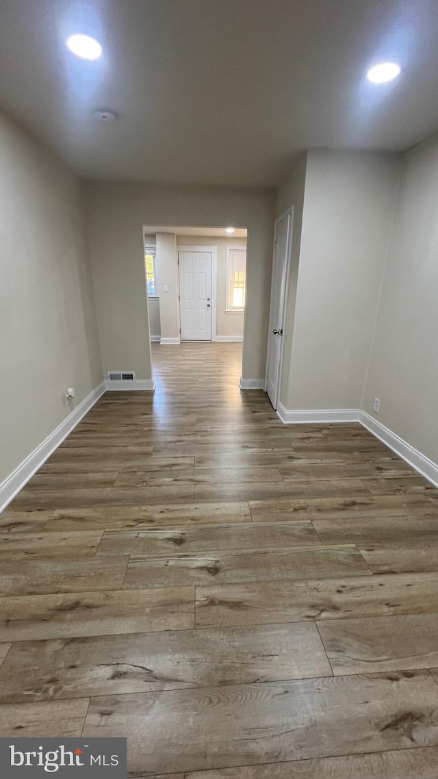 unfurnished room featuring light hardwood / wood-style flooring