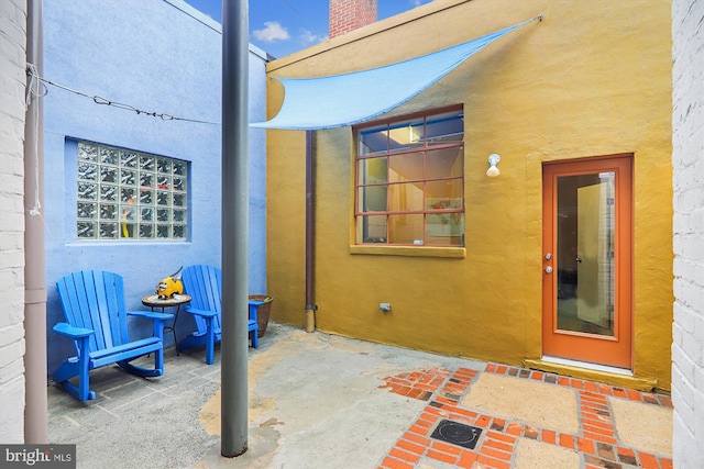 1312 Pennsylvania Ave SE, Washington, DC 20003 - entrance to property featuring stucco siding and a patio area