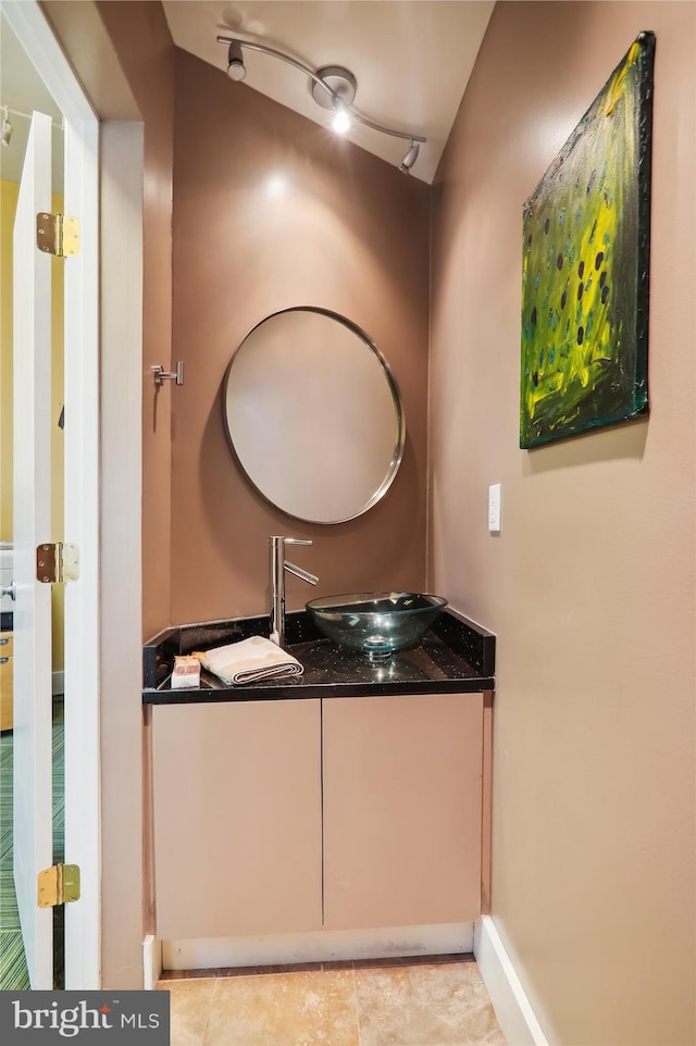 bathroom with vanity and tile patterned floors