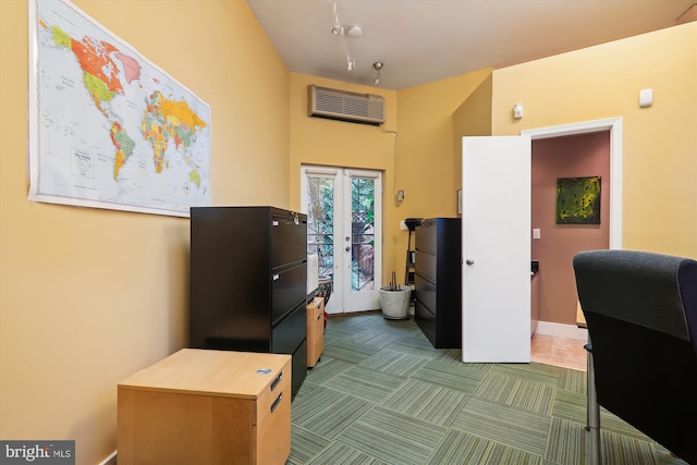 office with a wall unit AC, french doors, and carpet