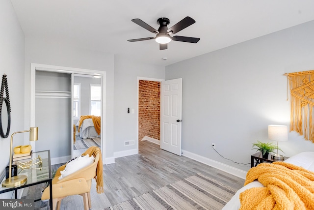 interior space with ceiling fan and light wood-type flooring