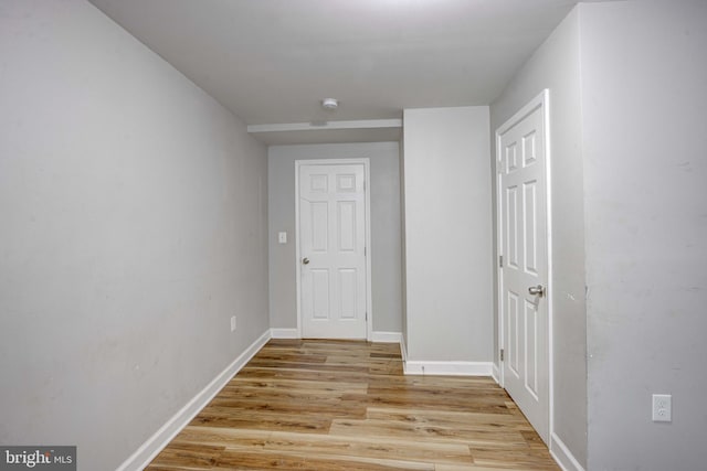 hallway featuring light wood-type flooring