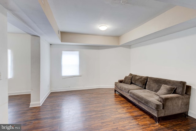 living room with dark wood-type flooring