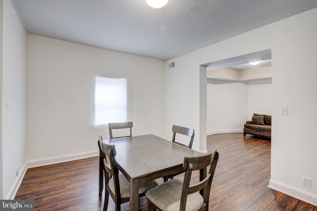 dining room featuring dark hardwood / wood-style floors