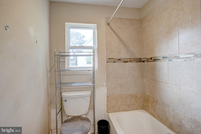 bathroom featuring tiled shower / bath combo