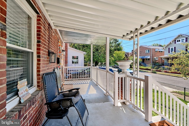 view of patio featuring a porch