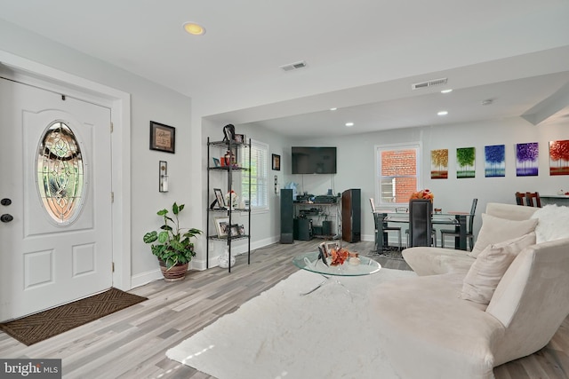 foyer with light hardwood / wood-style flooring