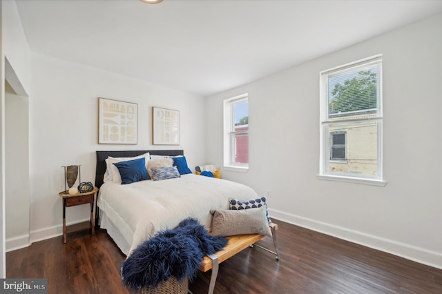 bedroom featuring dark hardwood / wood-style floors