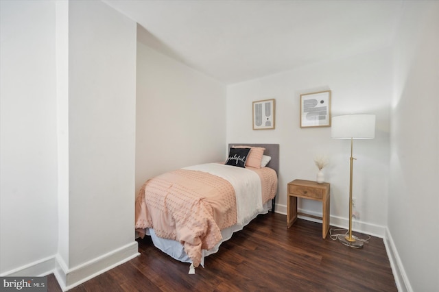 bedroom featuring dark hardwood / wood-style floors