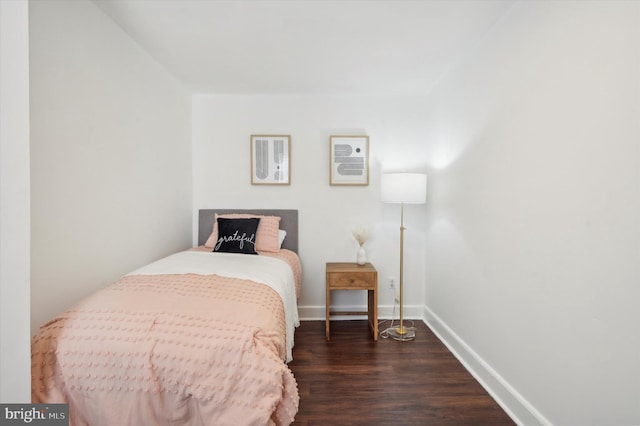 bedroom featuring dark hardwood / wood-style floors